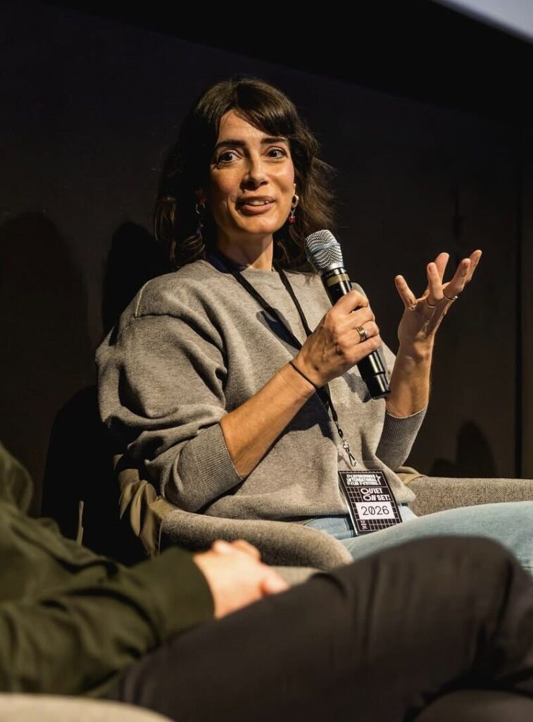 Daphne Maierna speaking on a panel at Playgrounds International Film Festival